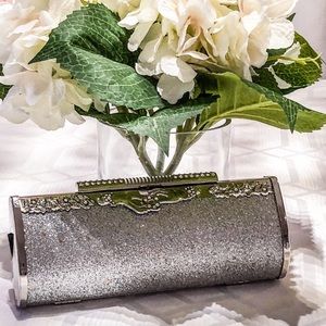 Stunning silver clutch.